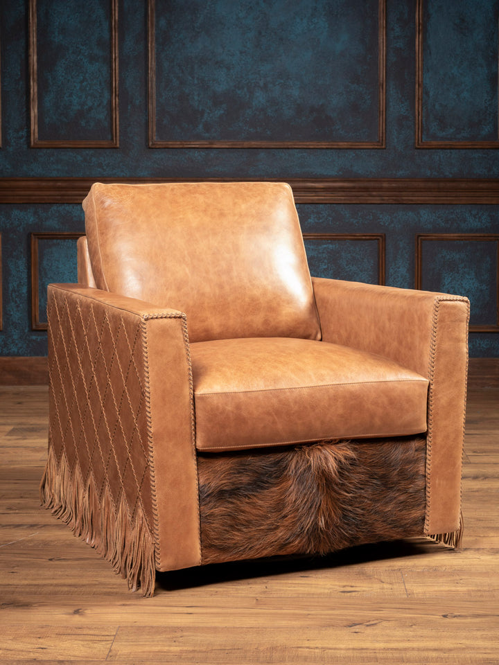 Belmont Laced Leather Swivel Accent Chair in full-grain leather with cowhide base and fringe detailing