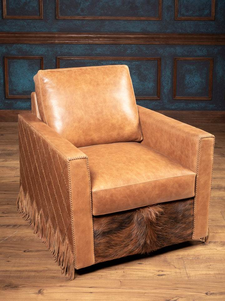 Western leather swivel accent chair handcrafted with laced stitching and cowhide trim