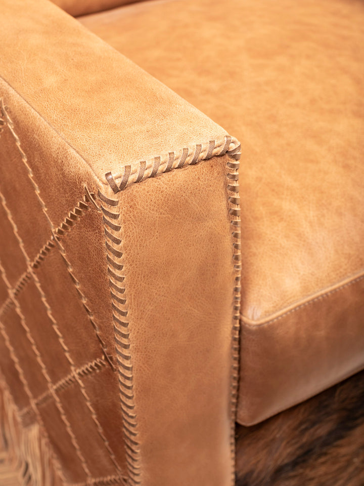 Detail view of hand-laced seams and full-grain leather on Belmont Laced Chair