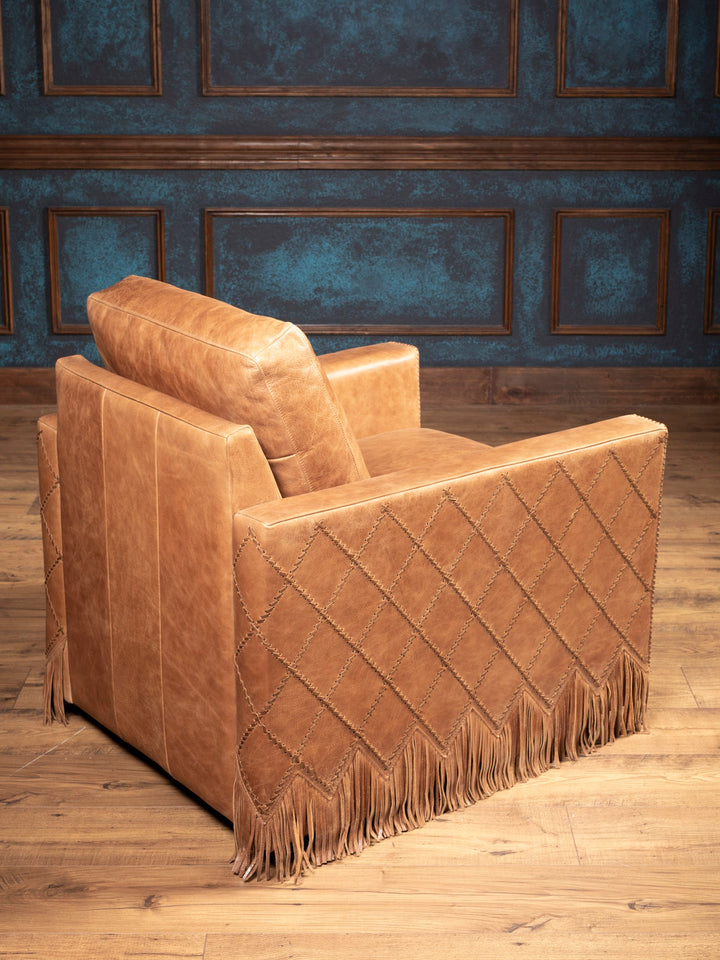 Back angle of Belmont Laced Leather Swivel Accent Chair with Western fringe design