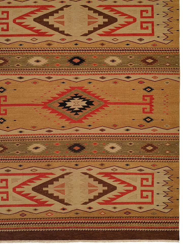 Patterned rug with geometric design in brown, red, and beige colors