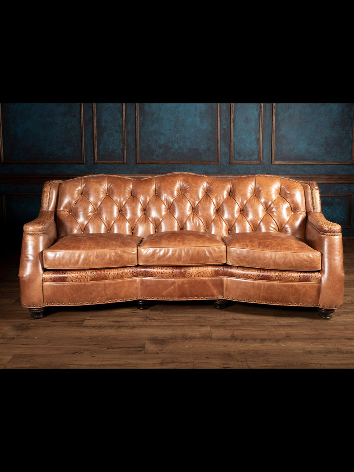 Front angle of the brown leather sofa with croc accents
