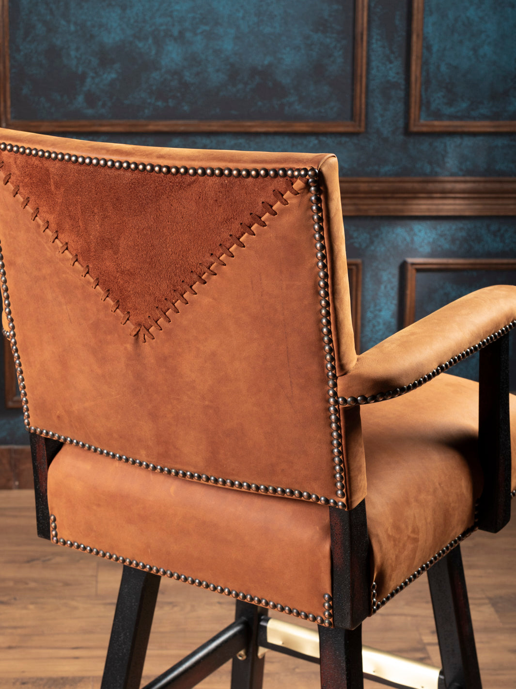Back view highlighting suede V insert with whipstitching on Sedona Saddle Leather Bar Stool