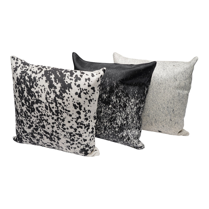 Set of three square pillows in varying black and white patterns, each featuring a different speckled design