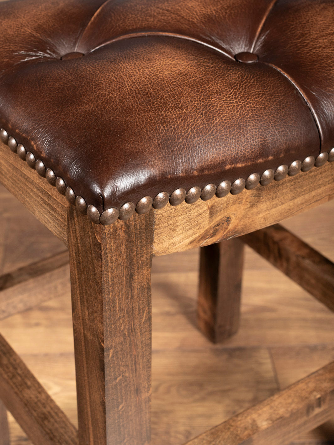 Tufted Brown Leather Saddle Stool