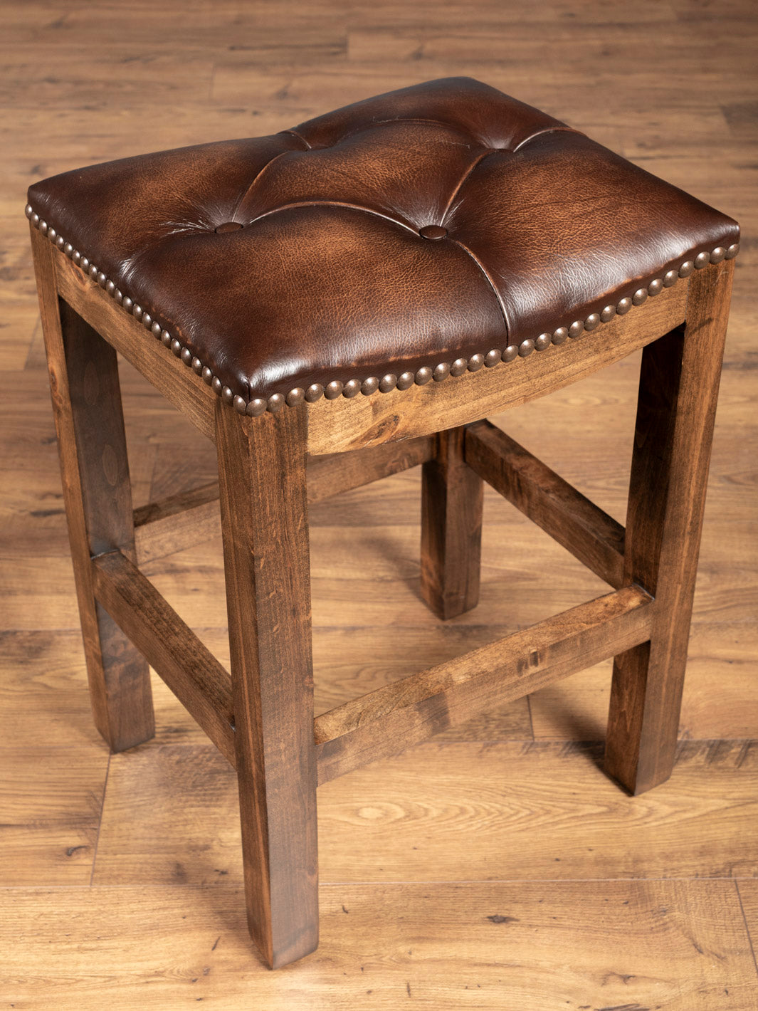 Tufted Brown Leather Saddle Stool