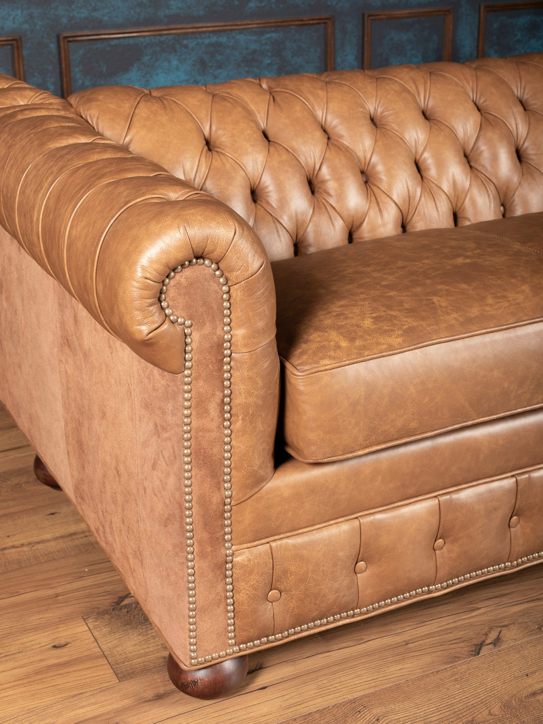 Tufted backrest and leather seating close-up
