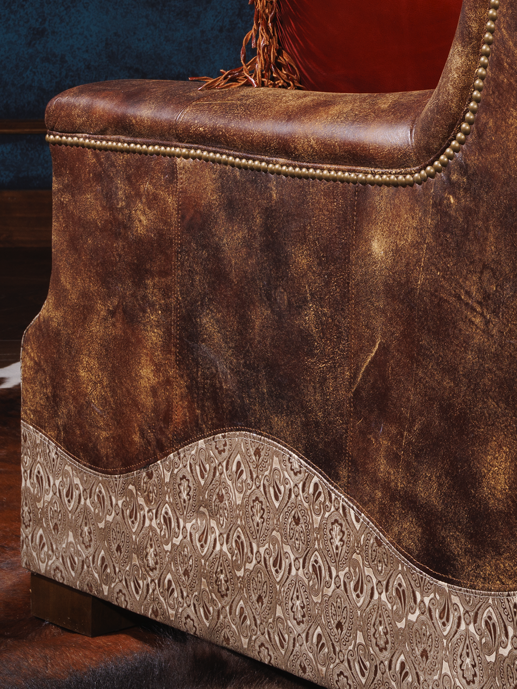 close view of leather on the side of western sofa with leather sides