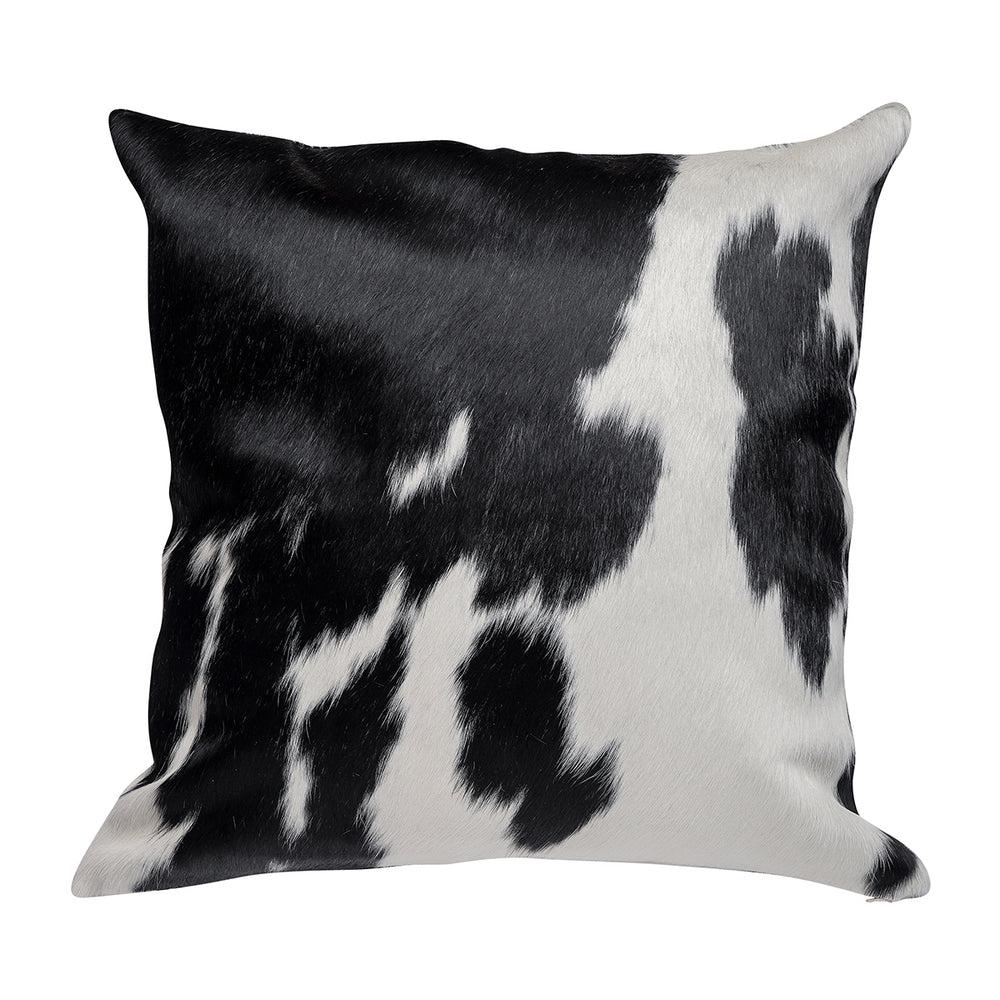 Square pillow with a patchwork design in black and white hair on hide