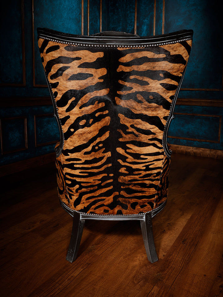 back view of leather/fabric accent chair with tiger stripe design