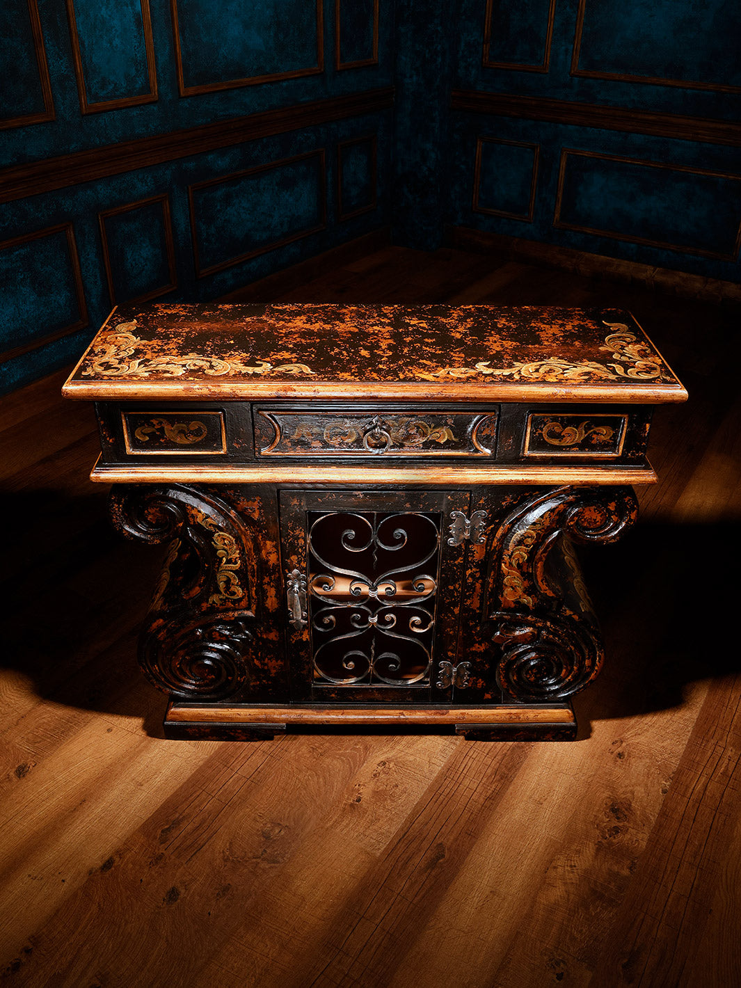 front view of dark brown wooden chest with iron