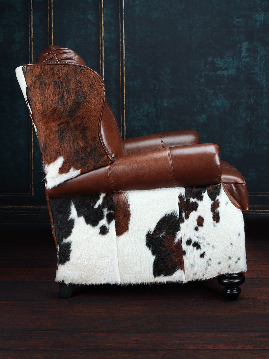 side view of brown leather recliner with tri color cowhide