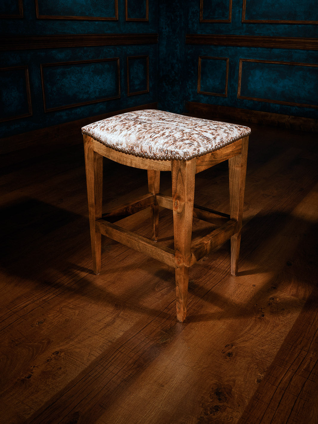 white leather barstool with no back