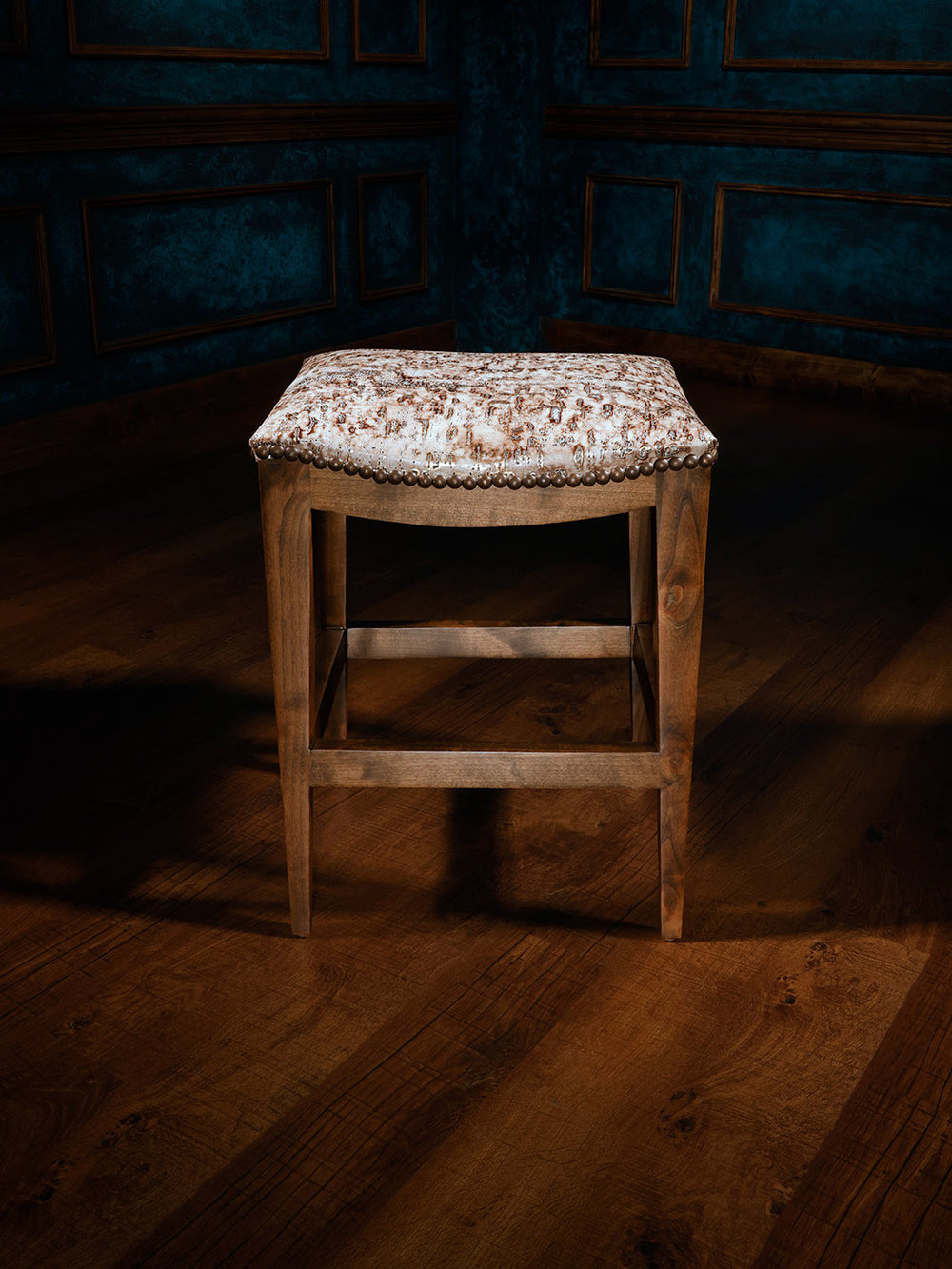 white leather barstool with no back