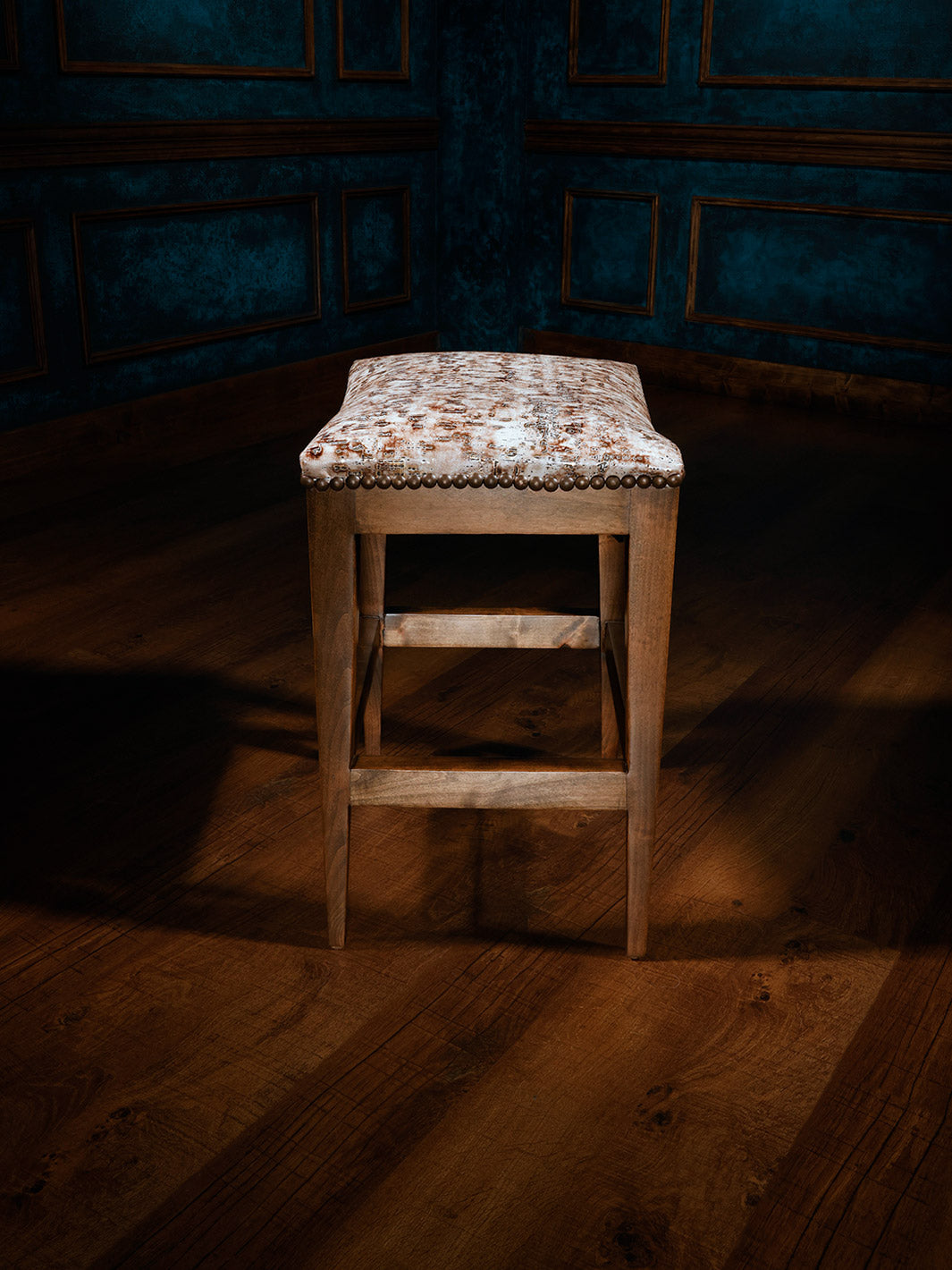 white leather barstool with no back