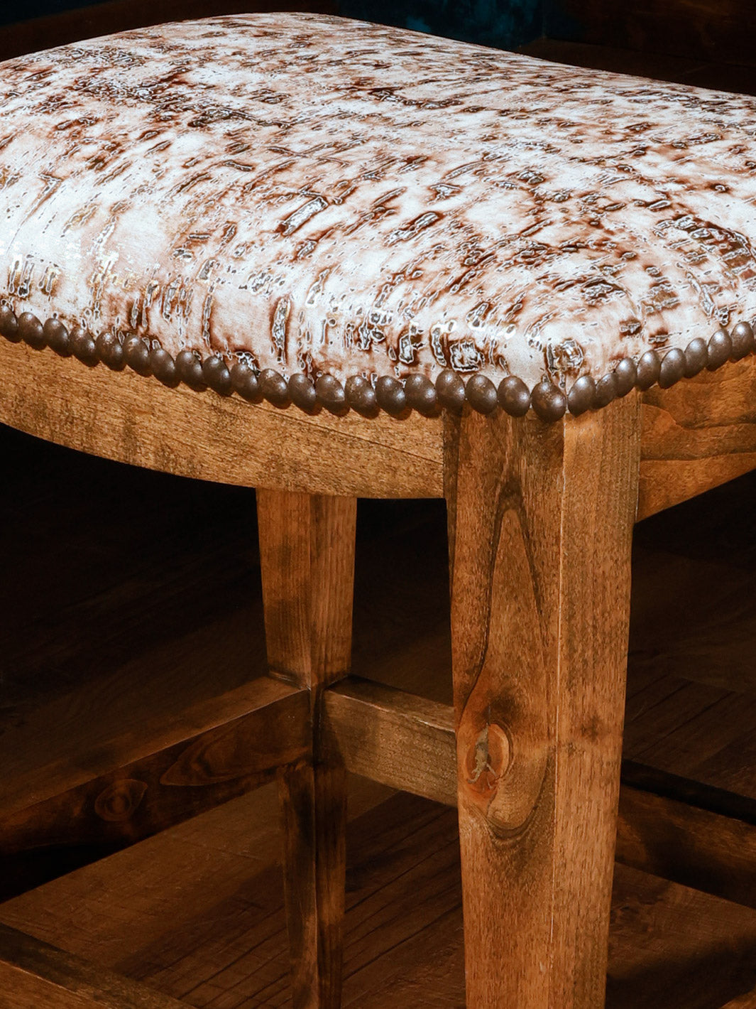 white leather barstool with no back