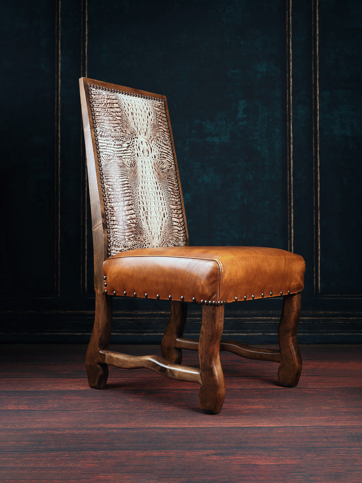 A brown leather dining chair with a crocodile patterned backrest, featuring a smooth leather seat and alder wood frame.