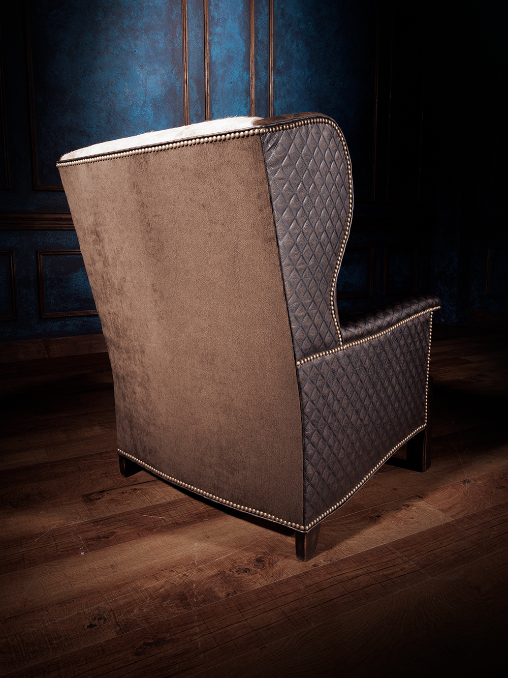 Wingback accent chair with Quilted Leather and Hair-on-Hide Accents