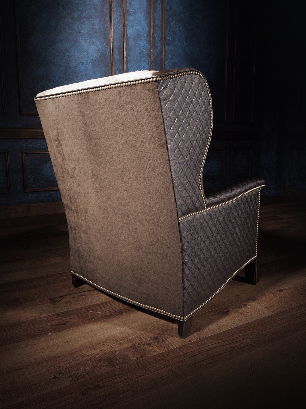 Wingback accent chair with Quilted Leather and Hair-on-Hide Accents