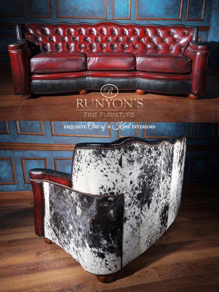Front and rear view of a western-style sofa with burgundy tufted leather, black embossed leather base, and white and black speckled cowhide back. Rustic design combines elegance and rugged appeal.