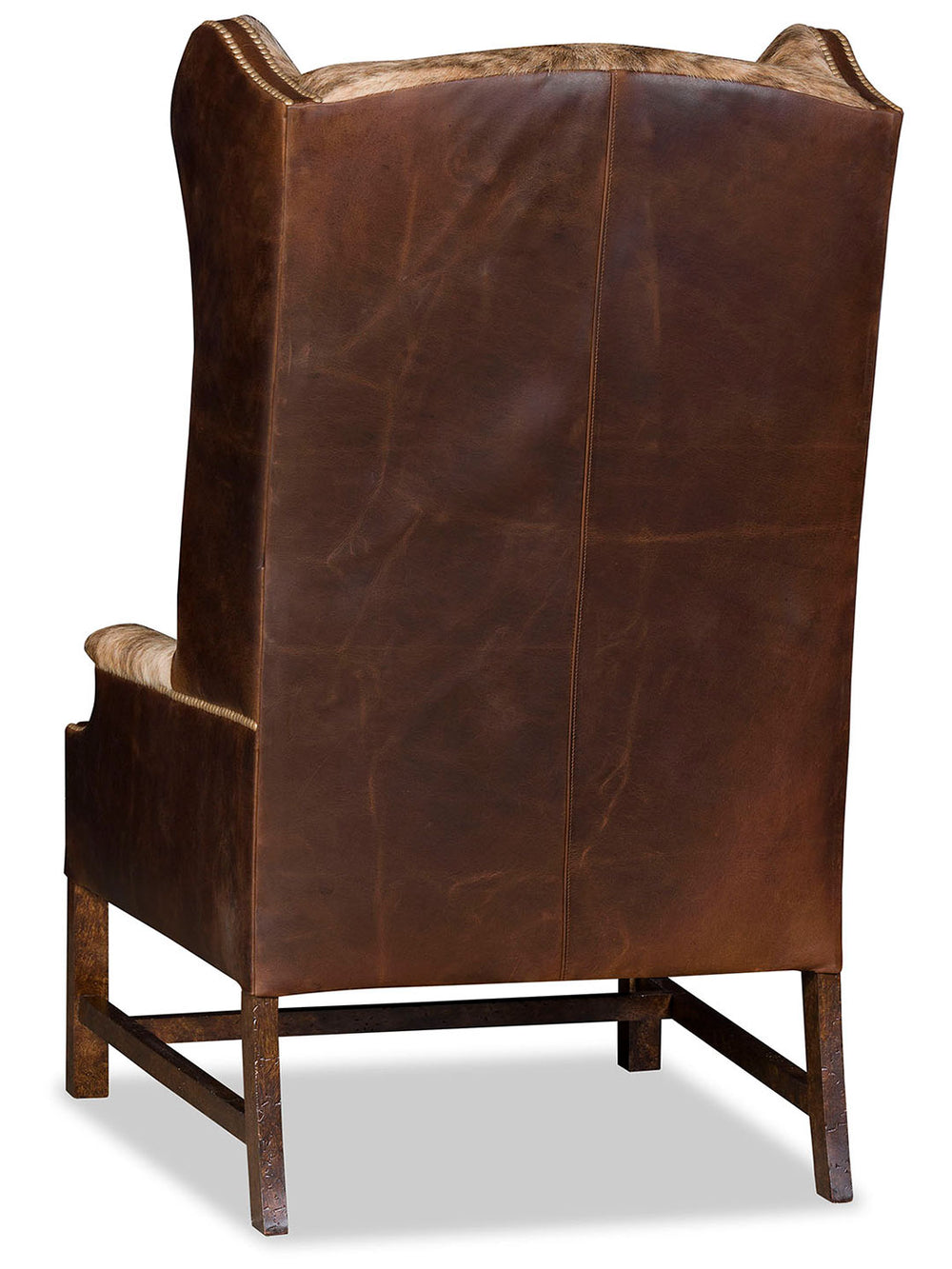 Rear view of the chair showcasing the full leather back panel in deep brown, highlighting the clean stitching and tall silhouette with rustic wooden legs.