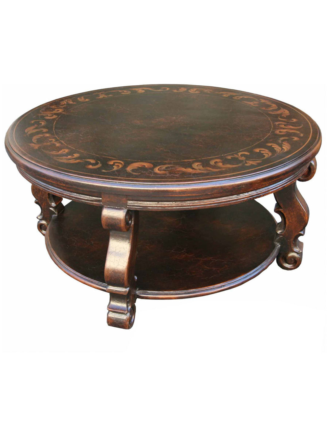 A hand-carved and painted wooden round coffee table with intricate patterns on the tabletop and ornate legs.