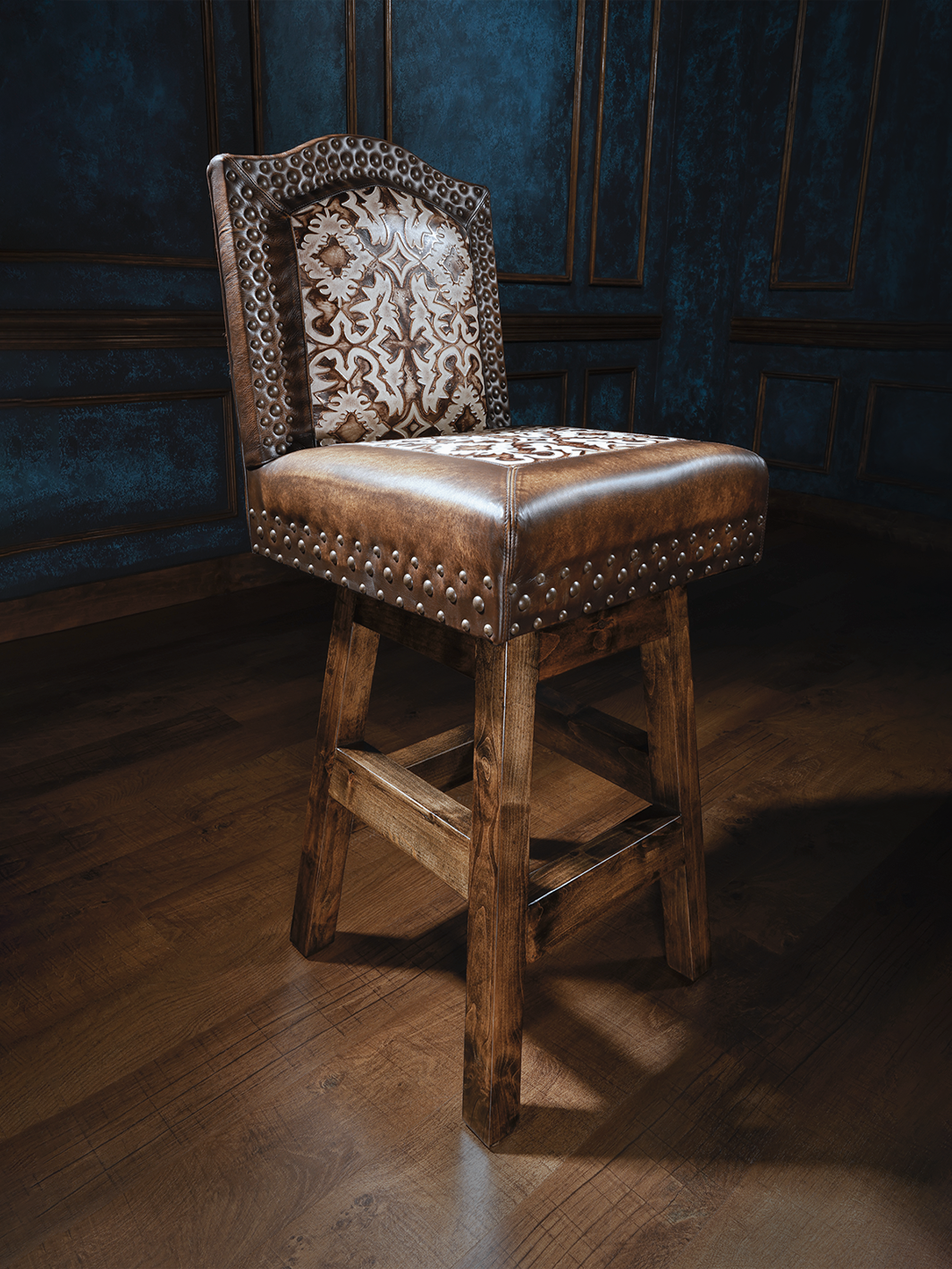 Old Henry Armless Chisum Western Bar Stool featuring leather upholstery, rustic design, and stud details, embodying a classic Western style.