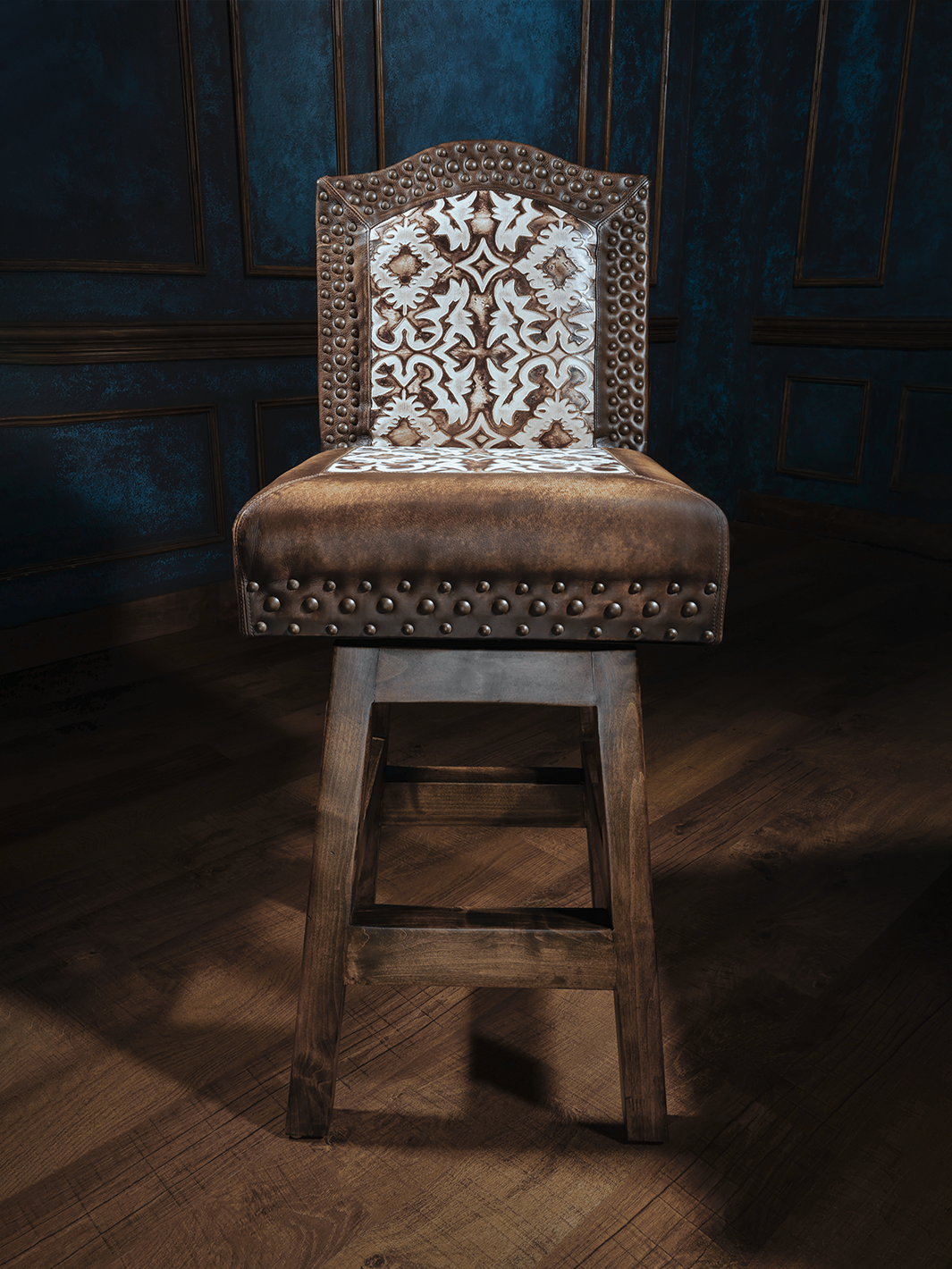 Old Henry Armless Chisum Western Bar Stool with studded leather upholstery, showcasing a rustic design, emphasizing comfort and Western charm.