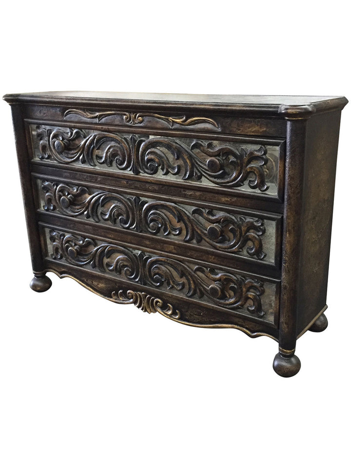 A hand-painted wooden dresser with intricate wood grain patterns and floral motifs in a classic design.