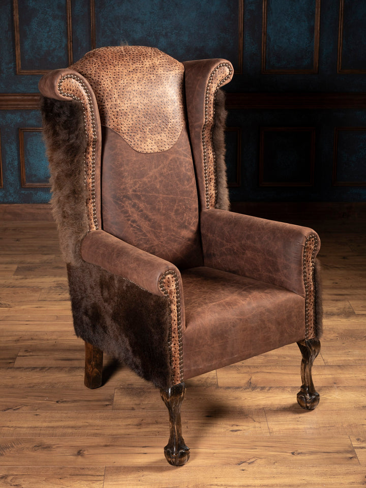 Angle shot of leather chair with buffalo and ostrich accents