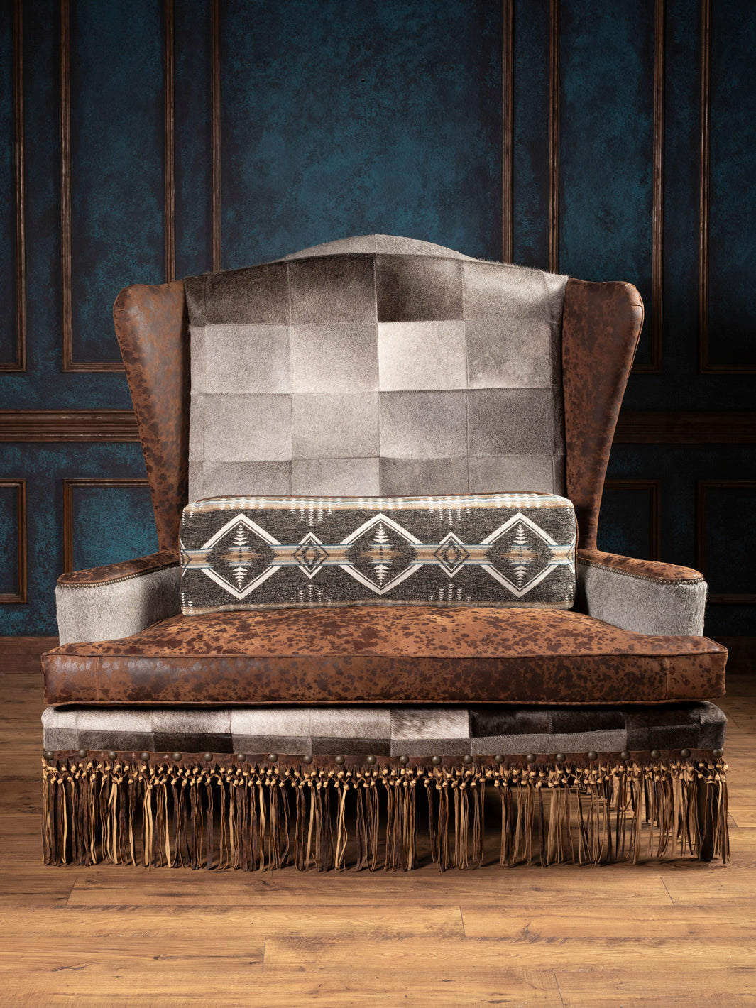 Straight-on view of Canyon Fringe Western Settee showing mixed textures and fringe accents