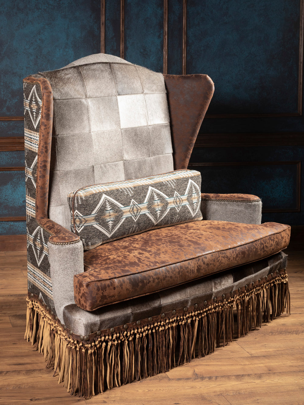 Side angle of Canyon Fringe Western Settee with Aztec cushion and full leather seat
