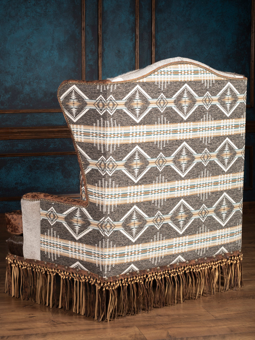 Back view of Canyon Fringe Western Settee showcasing Aztec-inspired fabric and fringe base