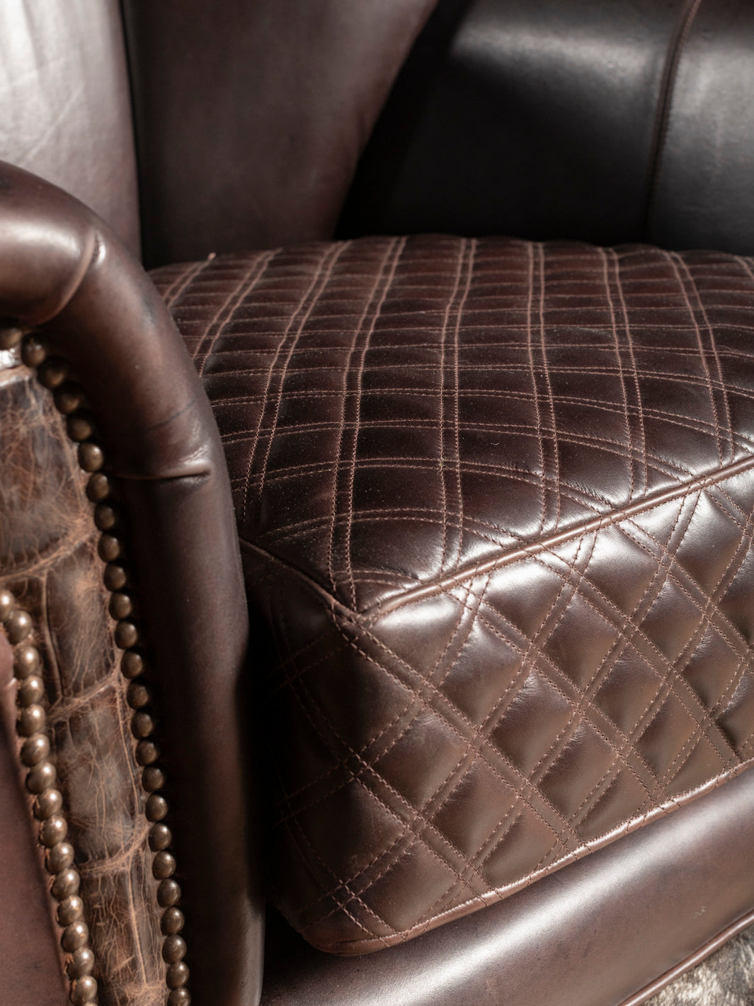 Diamond Stitch Leather Puma Swivel Chair