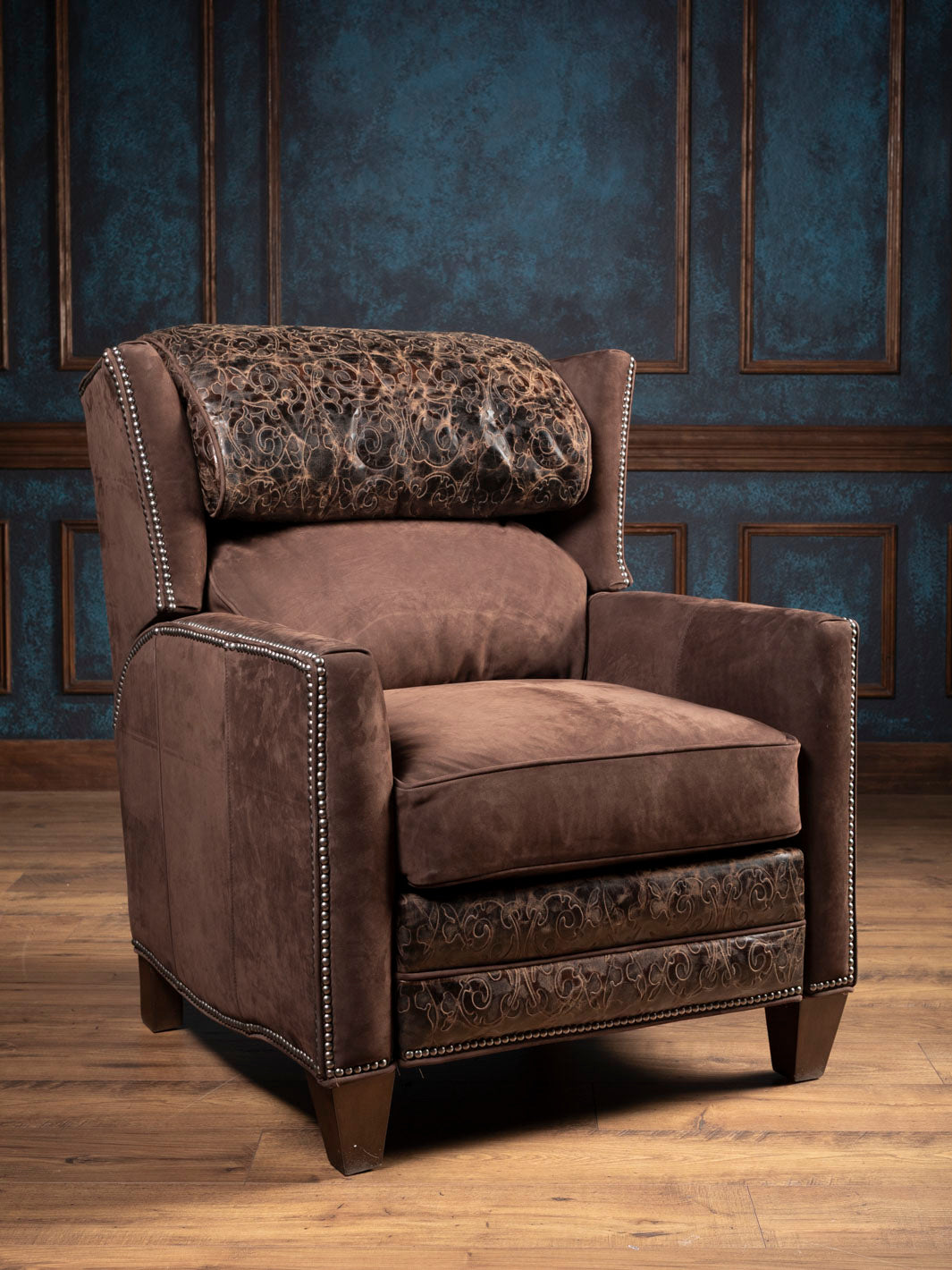 Brown leather recliner with rustic tooled accents
