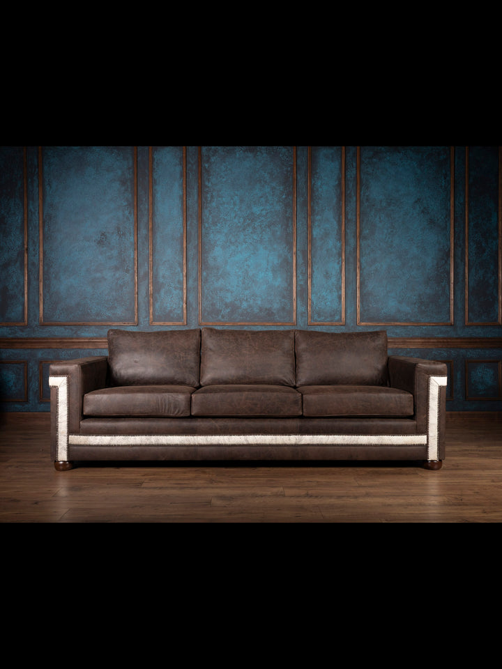 Front view of Granite Architect Leather Sofa in brown leather with gray cowhide and nailhead trim