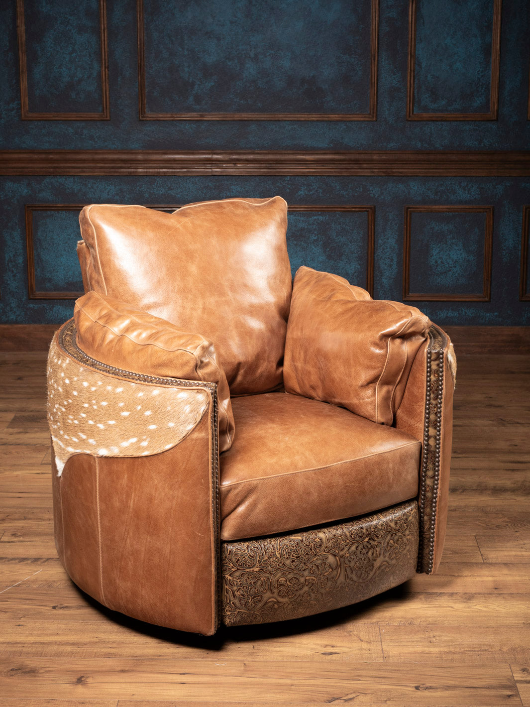 Haven Axis Leather Swivel Recliner – handcrafted Western recliner with Axis hide accents and tooled leather base