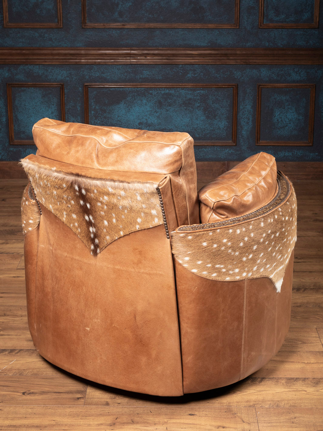 Back view of Haven Axis Leather Recliner showing genuine Axis hide and detailed nailhead trim – handcrafted in USA