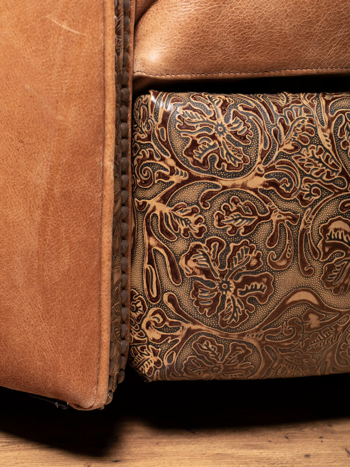 Detail of tooled leather base on Haven Axis Recliner – handcrafted Western furniture design