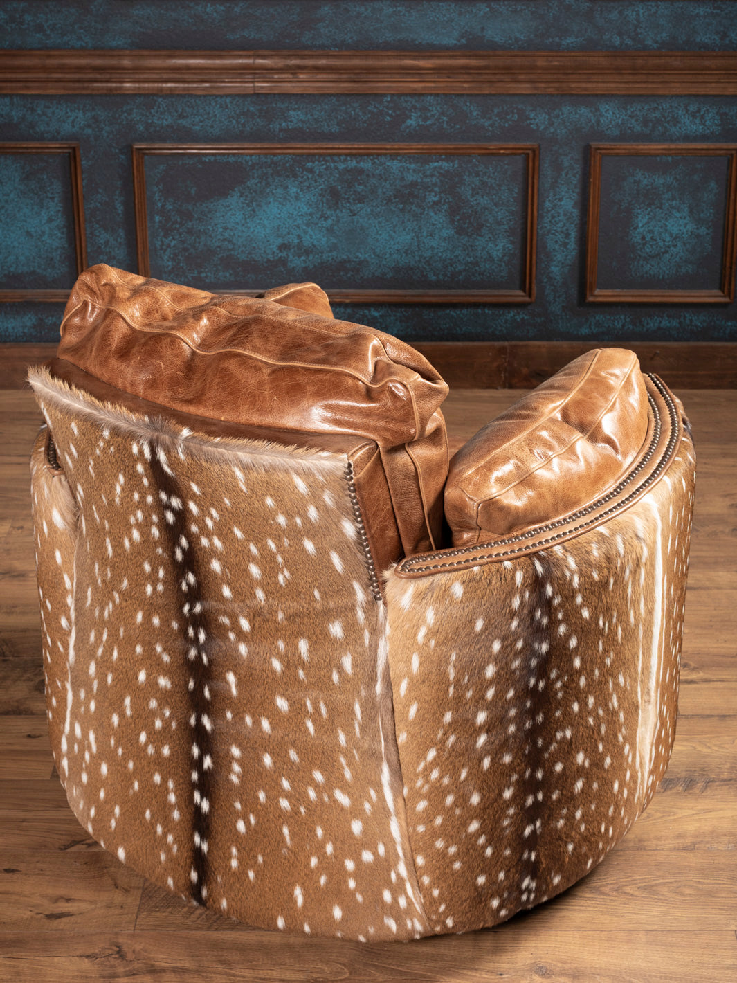 Full back panel wrapped in authentic axis hide for a striking rear view.