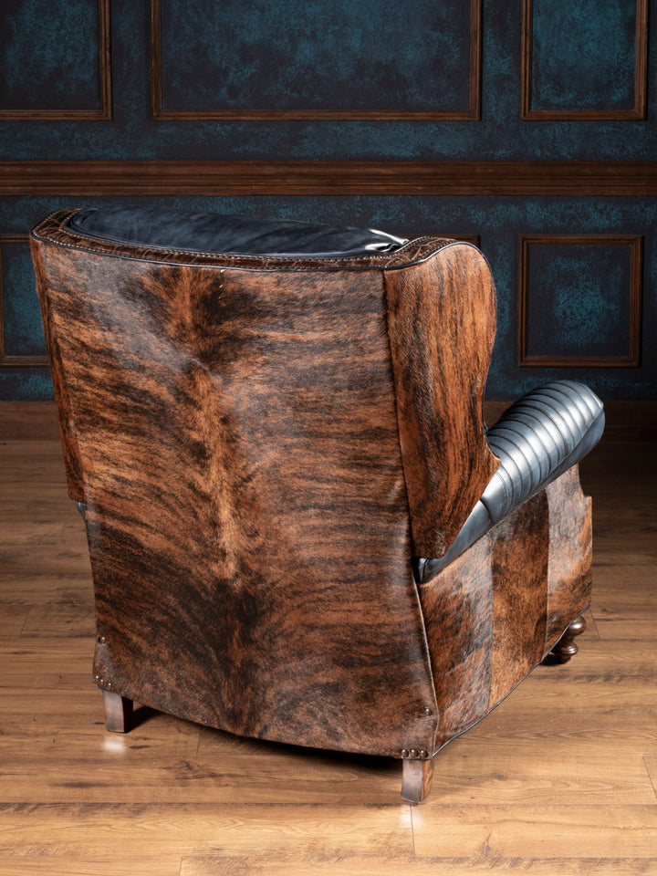Back view of Western leather and cowhide recliner featuring brindle hair-on-hide panels and handcrafted details