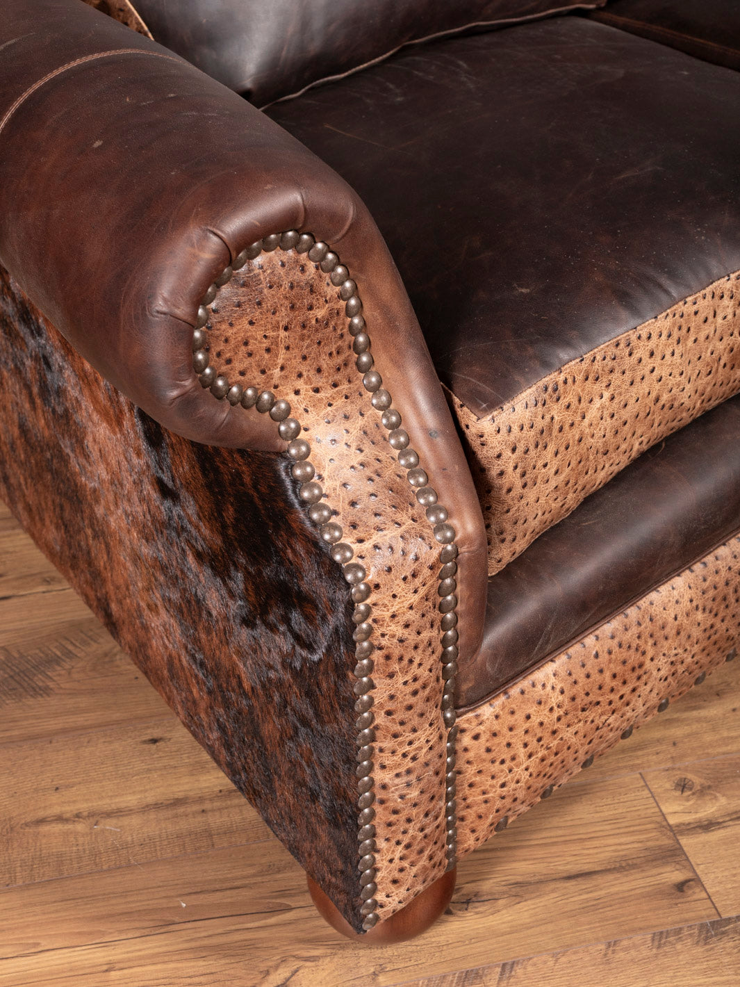 Ostrich Creek Curved Leather Sofa