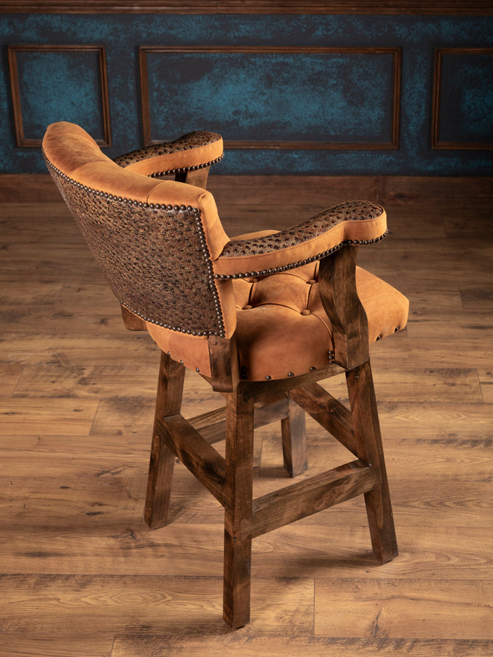 Angled view of full ostrich leather bar stool with rustic wood swivel base