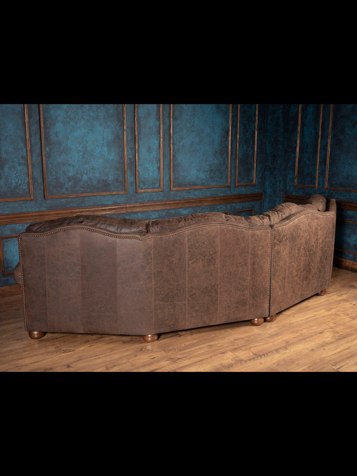 Outside back of brown leather sofa