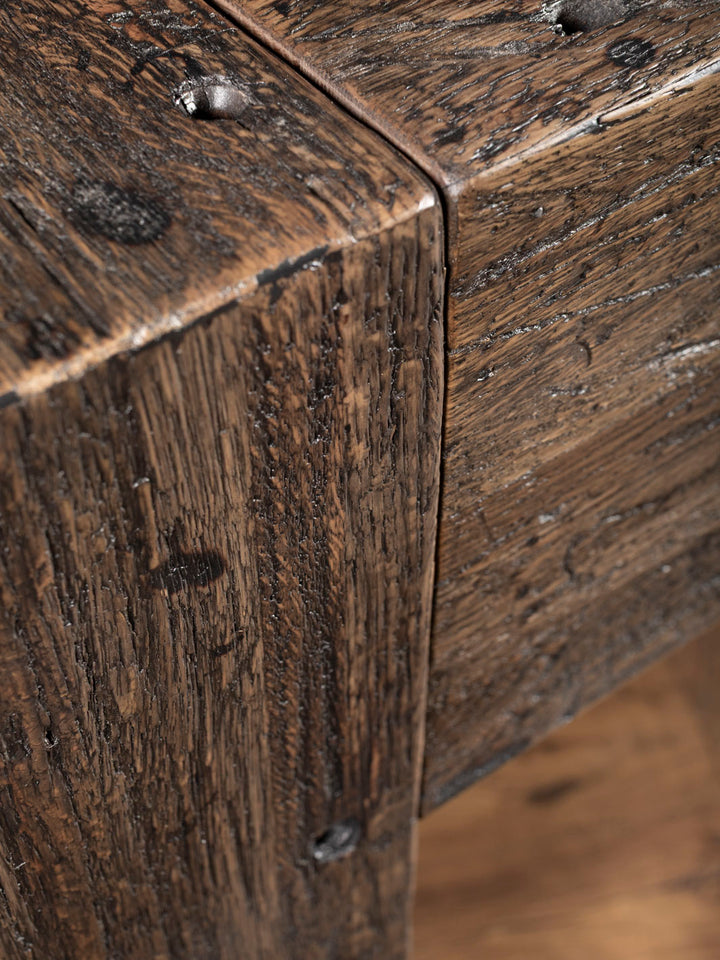 Close up of distressed wood console