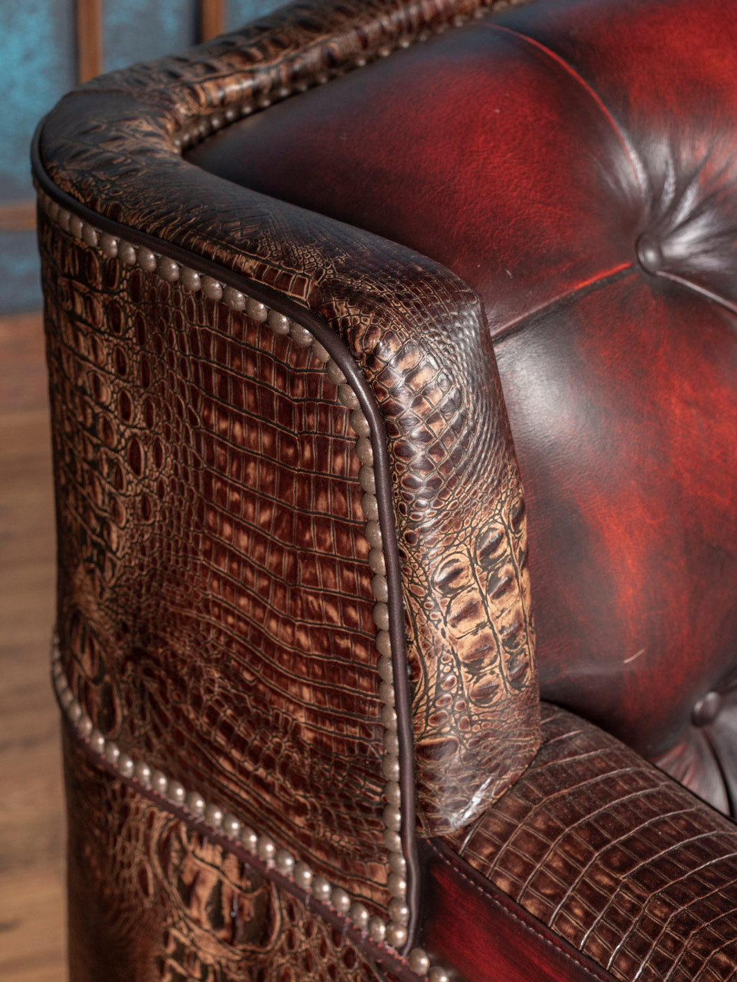 Close-up of a leather sofa with detailed texture and stitching.