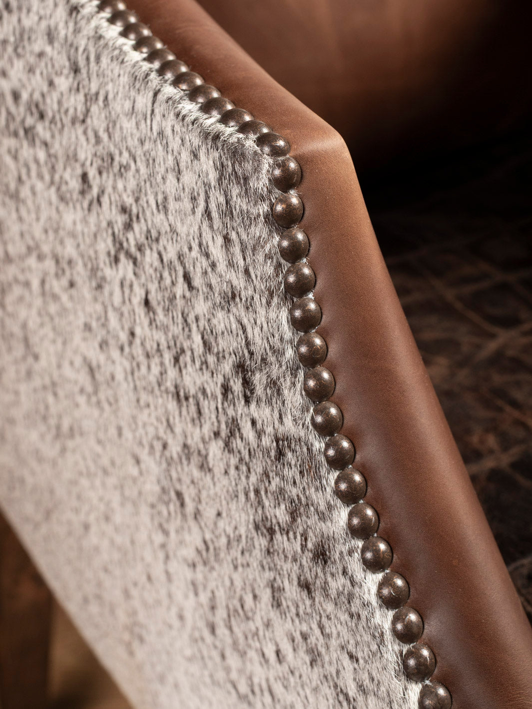 Close-up of cowhide accent.