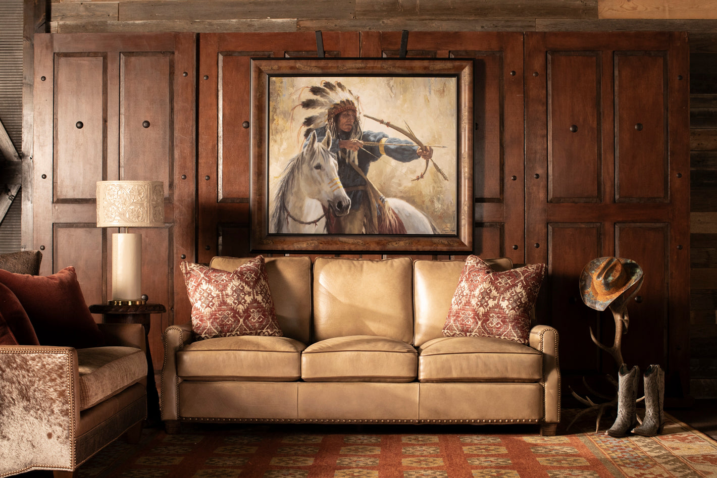 Modern ranch living room with clean-lined cream leather sofa, neutral palette, and restrained Western accents