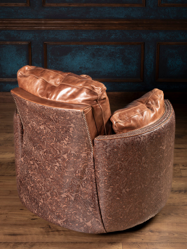 Rear view of Saddle Creek recliner featuring full tooled leather back, saddle leather cushions, and Western-style curves.