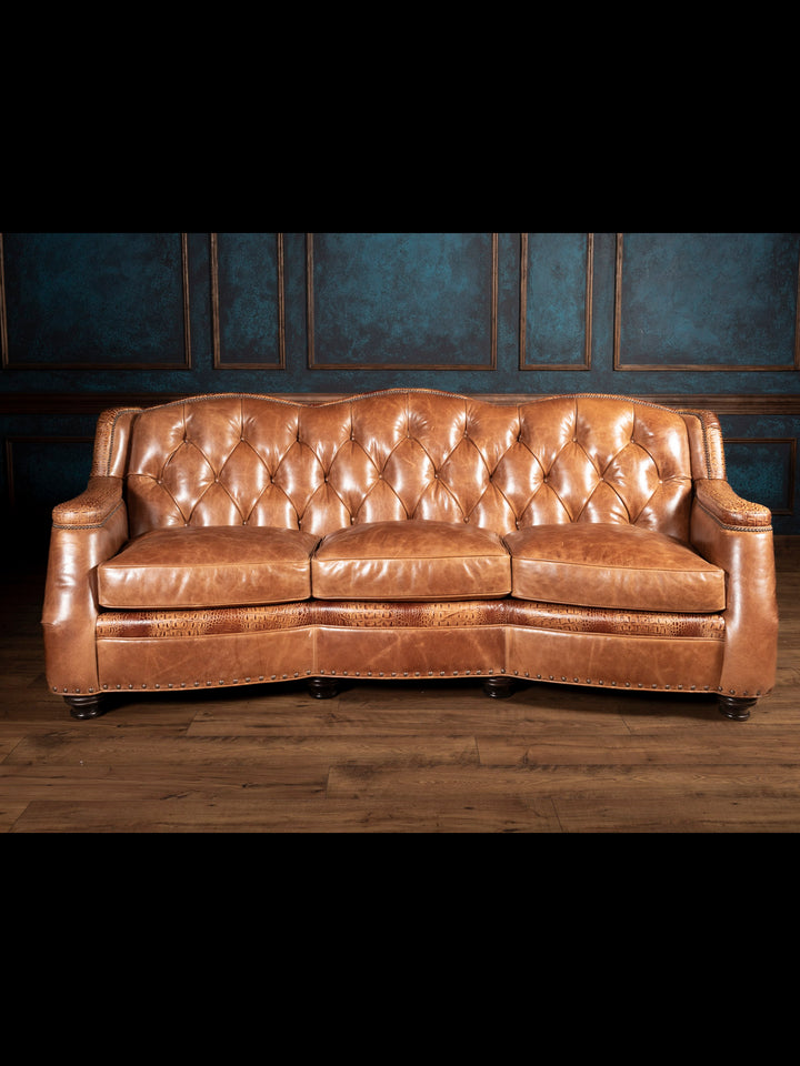 Front angle of the brown leather sofa with croc accents